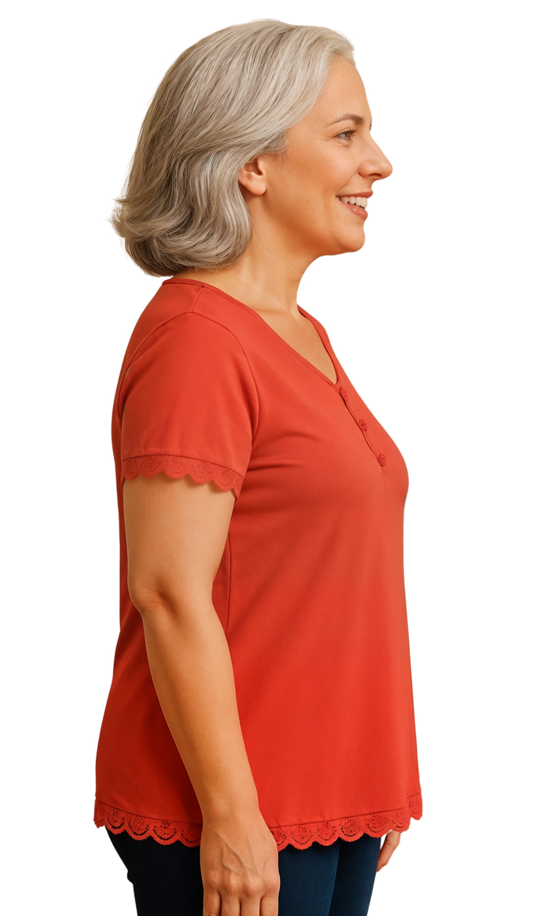 Woman wearing a red blouse with scalloped hem on a white background